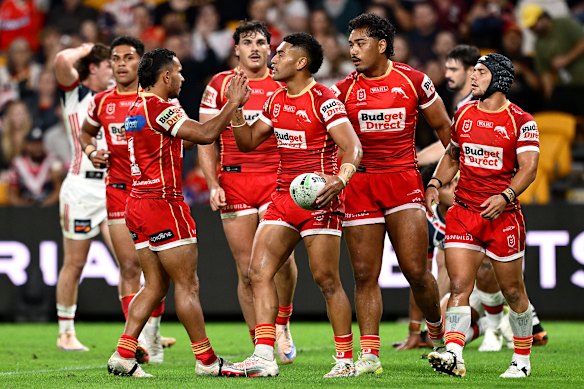 The Dolphins celebrate an Isaiya Katoa try.