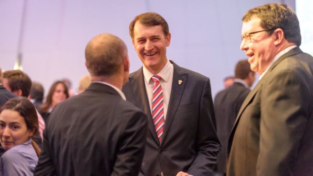 Lord Mayor Graham Quirk, with Campbell Newman (back to camera) and former transport minister and deputy premier Paul Lucas.