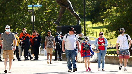 Crowds arrive on day one of the Second Test match between Australia and India at Melbourne Cricket Ground on December 26, 2020.