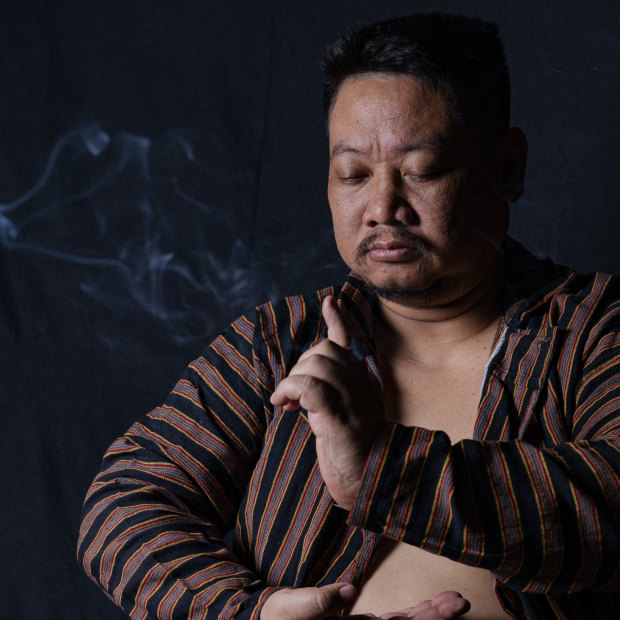 Popular Indonesian shaman Ki Kusomo at his office in Bekasi, West Java.