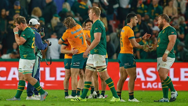 The Wallabies celebrate after their epic win at Ellis Park on Saturday.