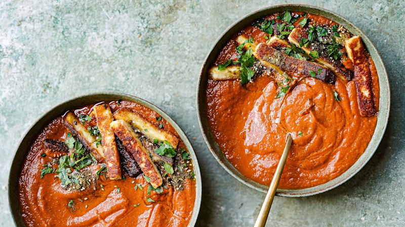 Recipes highlight hearty, textured soups with crispy toppings as main meals