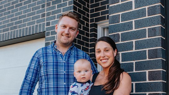 Jeremy and Suzy Whiting with their son George at their home in Ryde.