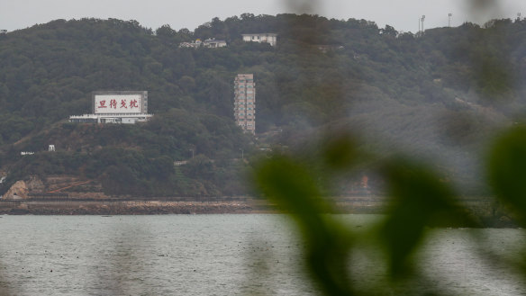 A billboard with a message reminding people to be ready to fight is seen on the Taiwanese island of Mazu that is close to Fujian, China.