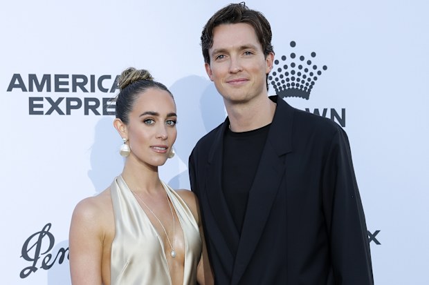 Scotty James and Chloe Stroll Glamour On The Grid at Albert Park Grand Prix Circuit on March 04, 2026 in Melbourne, Australia.