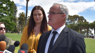 Peter Miller, with his daughter Tegan Connor, talks to the media about the suicide of his son Rhys Connor in a FIFO accomodation camp.