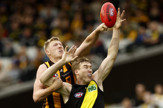 James Sicily and Tom Lynch leap for the ball.