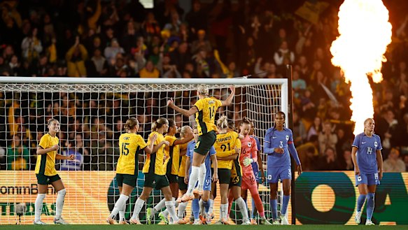 The Matildas celebrate their winning goal against France at Marvel Stadium.