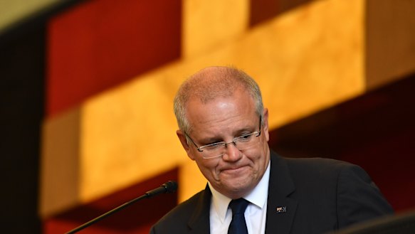 Prime Minister Scott Morrison performs a reading during Good Friday Easter services at St Charbel's Catholic Maronite Church at Punchbowl on Friday. 