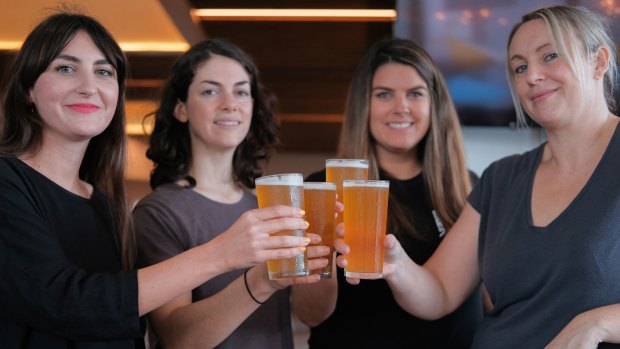 The girls from Gage Roads and the special beer brewed for International Women's Day this weekend.