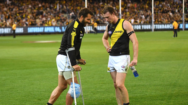 Alex Rance (left) chats with teammate Dylan Grimes after Richmond's round one win over Carlton.
