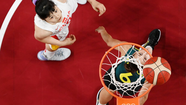 Steph Talbotof Team Australia and Yueru Li of Team China watch the ball on the rim on the basket during the first half. 