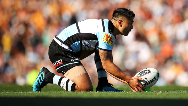 Shaun Johnson lines up a kick at goal.