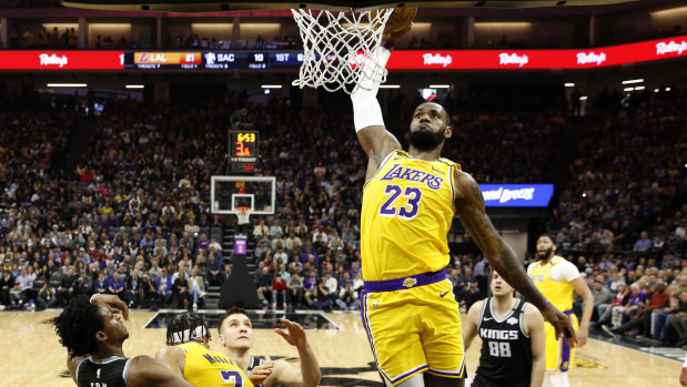 Forward march: LeBron James goes to the basket for the Lakers against the Sacramento Kings.