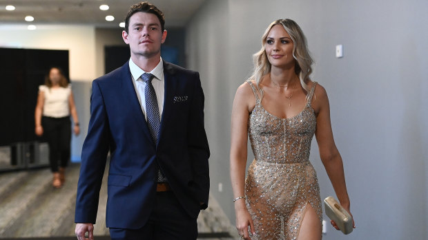 Glitz and glamour: Lachie Neale and his wife Julie arrive at The Gabba stadium in Brisbane for the AFL's virtual best and fairest count.