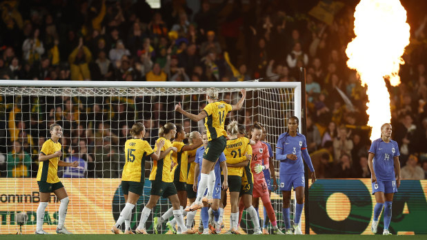 The Matildas celebrate their winning goal against France at Marvel Stadium.
