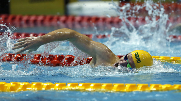 Toughing it out: Jack McLoughlin leads the way during his gold-medal swim in the men's 400m freestyle final.