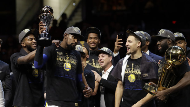 Golden boys: Kevin Durant, second from left, celebrates after the Warriors defeated the Cavaliers.