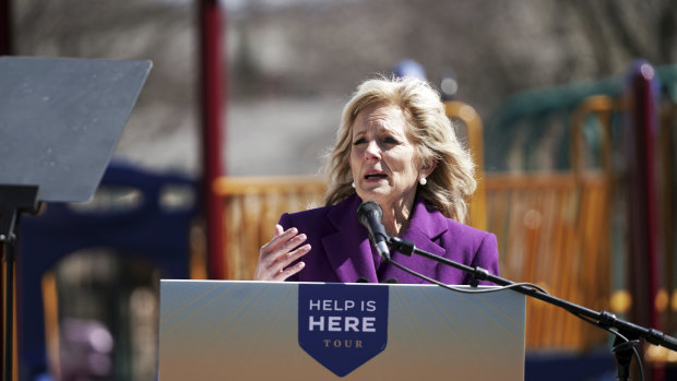 First lady Jill Biden speaks at a playground outside of the Samuel Smith Elementary School in Burlington, New Jersey.