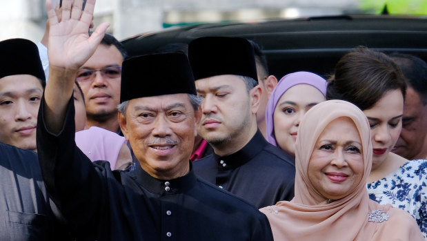 Malaysian PM Muhyiddin Yassin, left.