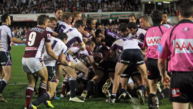 Manly and Melbourne players go at it during the infamous "Battle of Brookvale" in 2011.