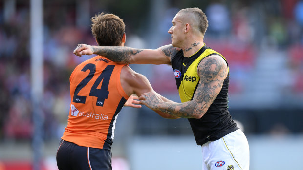 Dustin Martin reacts poorly to the attention of De Boer.