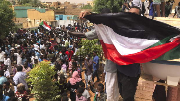 Sudanese protesters gather outside the house of a man killed by security forces on June 3 in Khartoum.