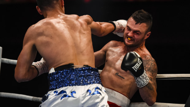 Dwight Ritchie evades a punch from Tim Tszyu. 