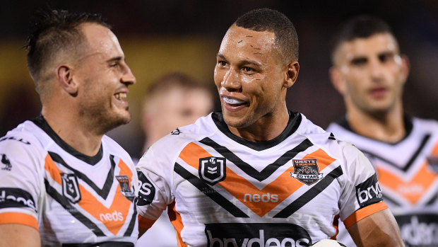Footy's a funny game: Wests Tigers five-eighth Josh Reynolds (left).