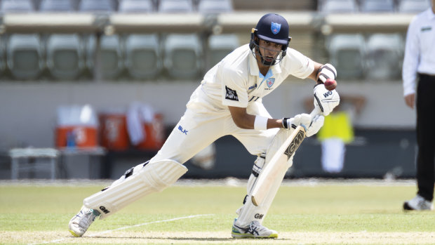 Jason Sangha in action for NSW during the Sheffield Shield match against Qld at Manuka Oval on Friday.