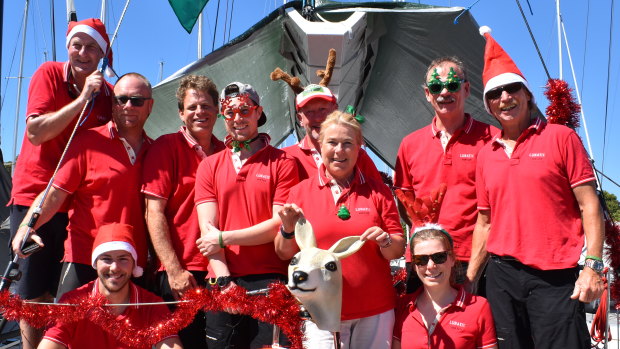 The crew of Lunatix on Christmas Day ahead of the Sydney to Hobart.