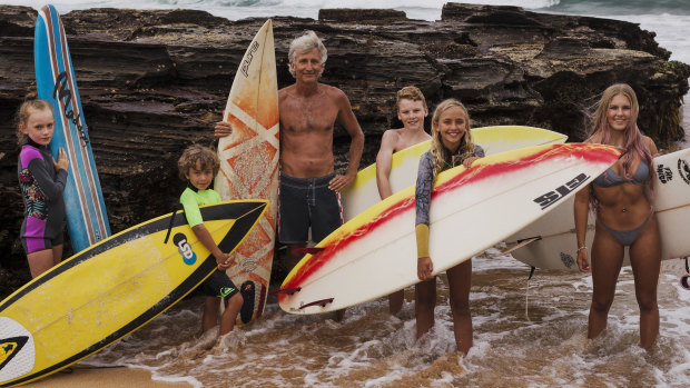Adriaan van der Wallen, centre, with surfers including Blaze Roberts (right) and Josh Leigh (yellow and white board). 