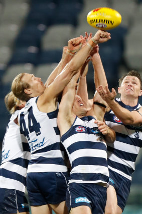CatsRhys Stanley, Tom Stewart, Joel Selwood and Patrick Dangerfield all reach for the footy during their win over Hawthorn.