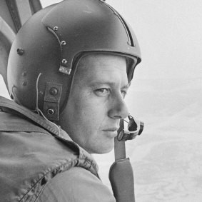 Flight Lieutenant Bob Grandin at the controls of an RAAF helicopter during the Vietnam War. 