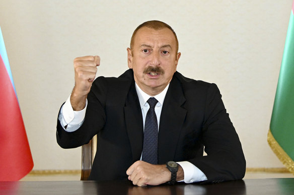 Azerbaijani President Ilham Aliyev gestures as he addresses the nation in Baku, following the clashes. 