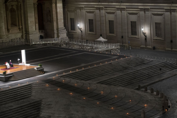 Pope Francis presides over a ceremony in a deserted St Peter’s square on Good Friday. 