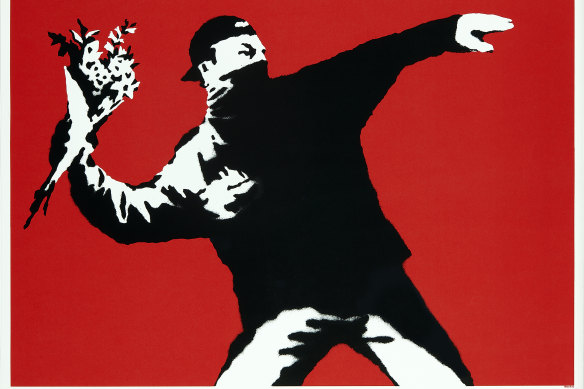 Banksy’s Love Is In The Air (2003), was auctioned on Wednesday.