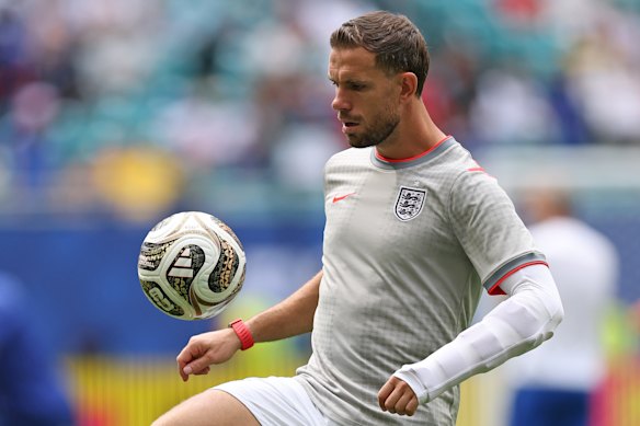 Jordan Henderson warming up before the match.