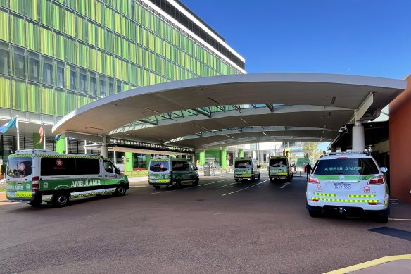 Ambulances wait outside of the emergency department at Sir Charles Gairdner Hospital. 