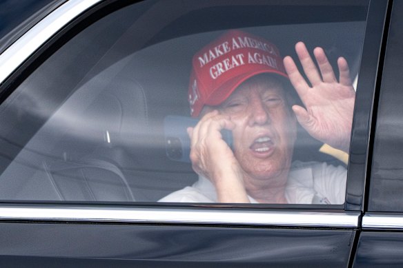 US President Donald Trump arrives at the Trump International Golf Club in West Palm Beach, Florida, on Friday.