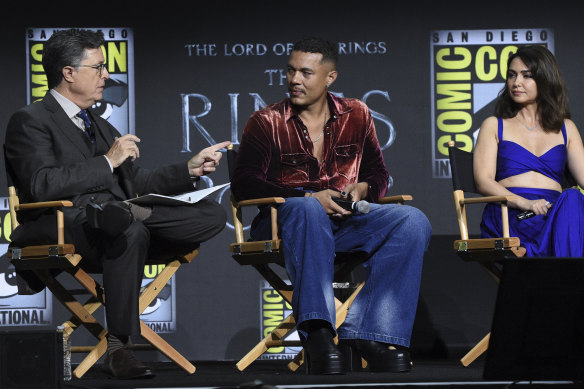 Ismael Cruz Cordova and Nazanin Boniadi speak with Stephen Colbert on the Lord of the Rings: The Rings of Power panel at Comic-Con.
