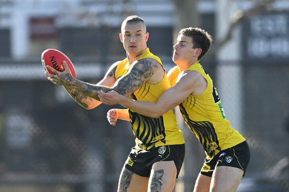 Tackling was back at Richmond training on Monday, as the AFL's restrictions on full-contact training lifted.