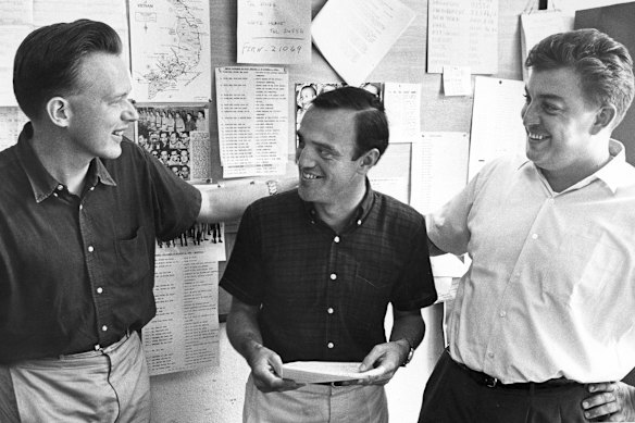 AP reporter Peter Arnett (centre) is congratulated on his 1966 Pulitzer Prize for international reporting by fellow Pulitzer winners Malcolm Browne (left) and Horst Faas. Browne shared the 1964 Pulitzer for international reporting, and Faas won the 1965 Pulitzer for photography.  