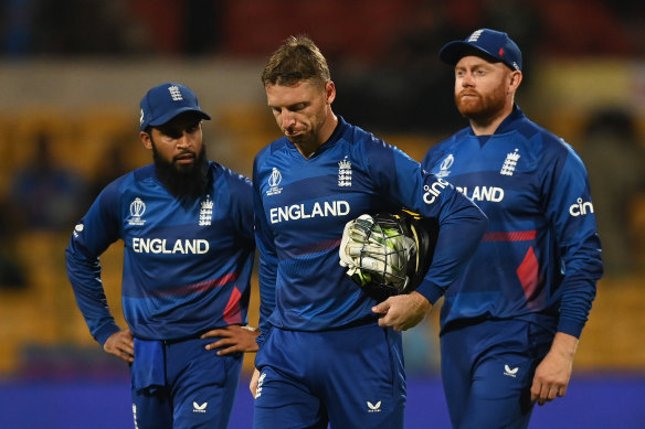 England’s Adil Rashid, Jonny Bairstow and Jos Buttler cut dejected figures following the loss. 