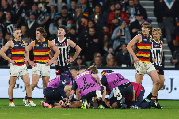 Adelaide’s Izak Rankine was concussed after Dan Houston elected to bump him.