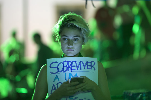 A woman holds a sign with a message that reads in Portuguese: “To survive an abortion is a class privilege,” during a protest demanding the legalisation of abortion without exception, in Rio de Janeiro, Brazil.
