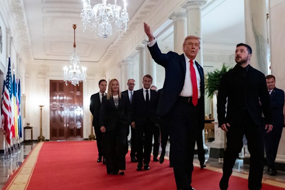 US President Donald Trump and Ukrainian President Volodymyr Zelensky, followed by French President Emmanuel Macron (centre), and Italian Prime Minister Giorgia Meloni (second from left) along with other European leaders, at the White House.
