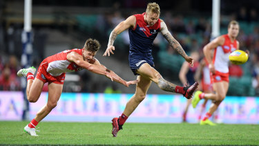 Catch me if you can: Melbournes James Harmes scores a goal in the win that condemned the Swans to a 1-3 start to the AFL season.