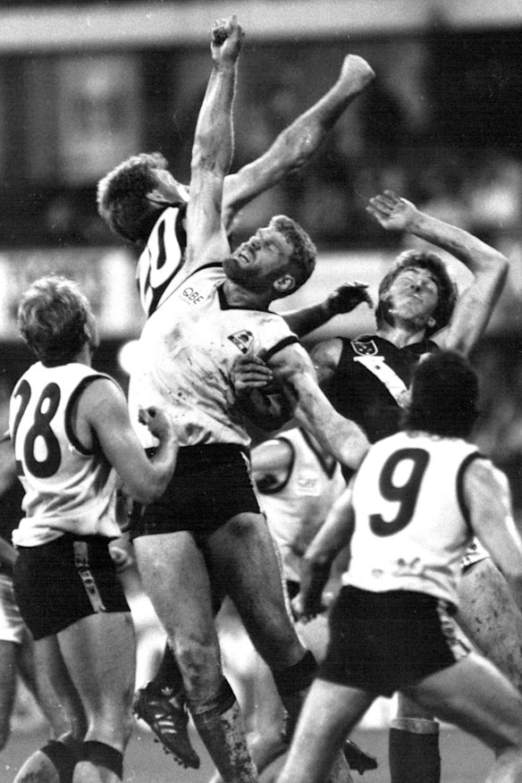 Wild in the wet ... NSW's John Ironmonger does battle with the big V.