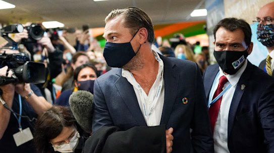 Leonardo DiCaprio is swarmed at the Glasgow summit.